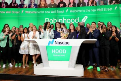 Robinhood's Baiju Bhatt and Vlad Tenev celebrate after ringing the bell on Robinhood Markets IPO Listing Day on July 29, 2021 in New York City.