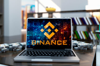 Image of laptop with Binance company logo